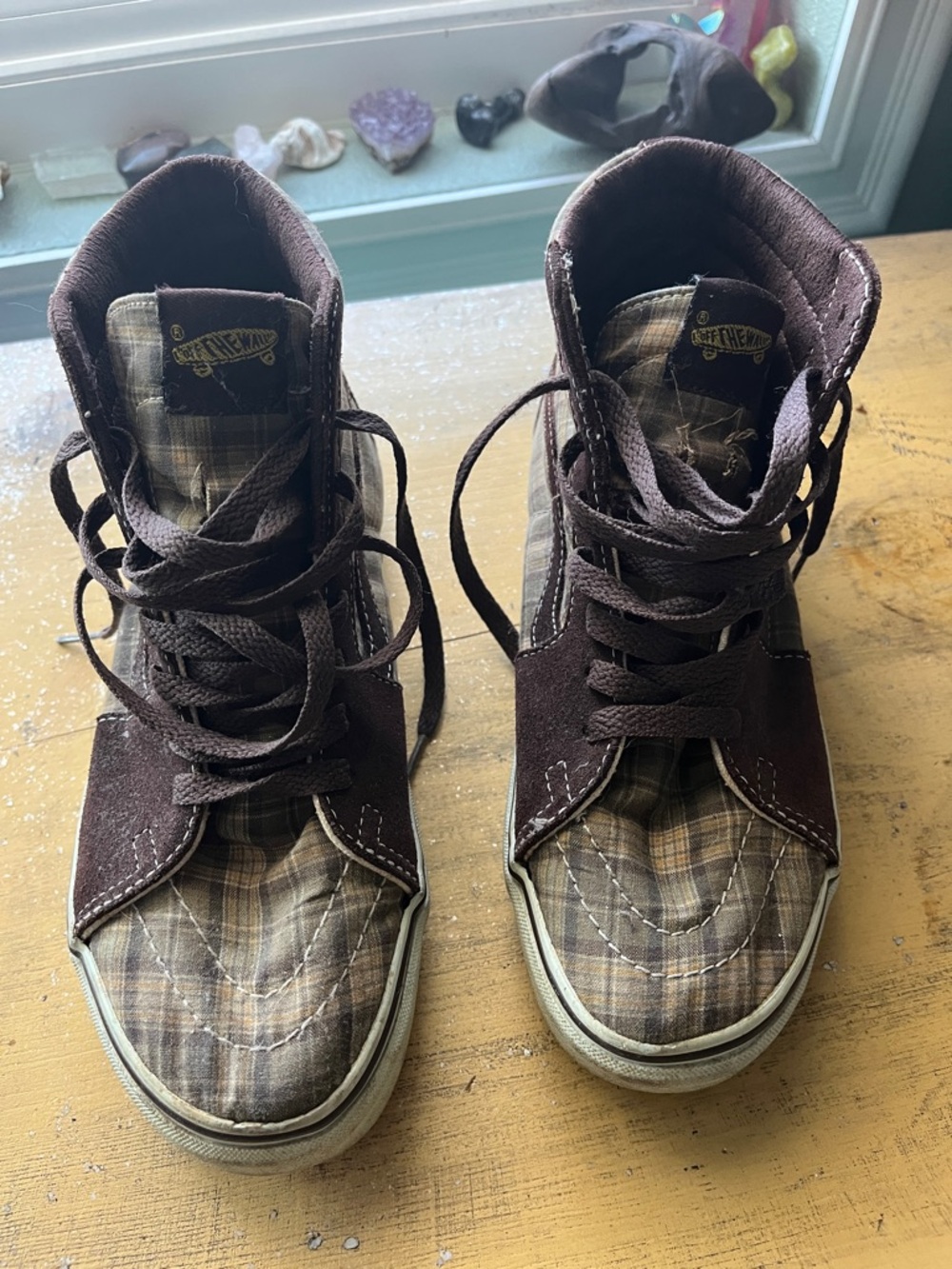High-Top Plaid and Brown Vans sneakers